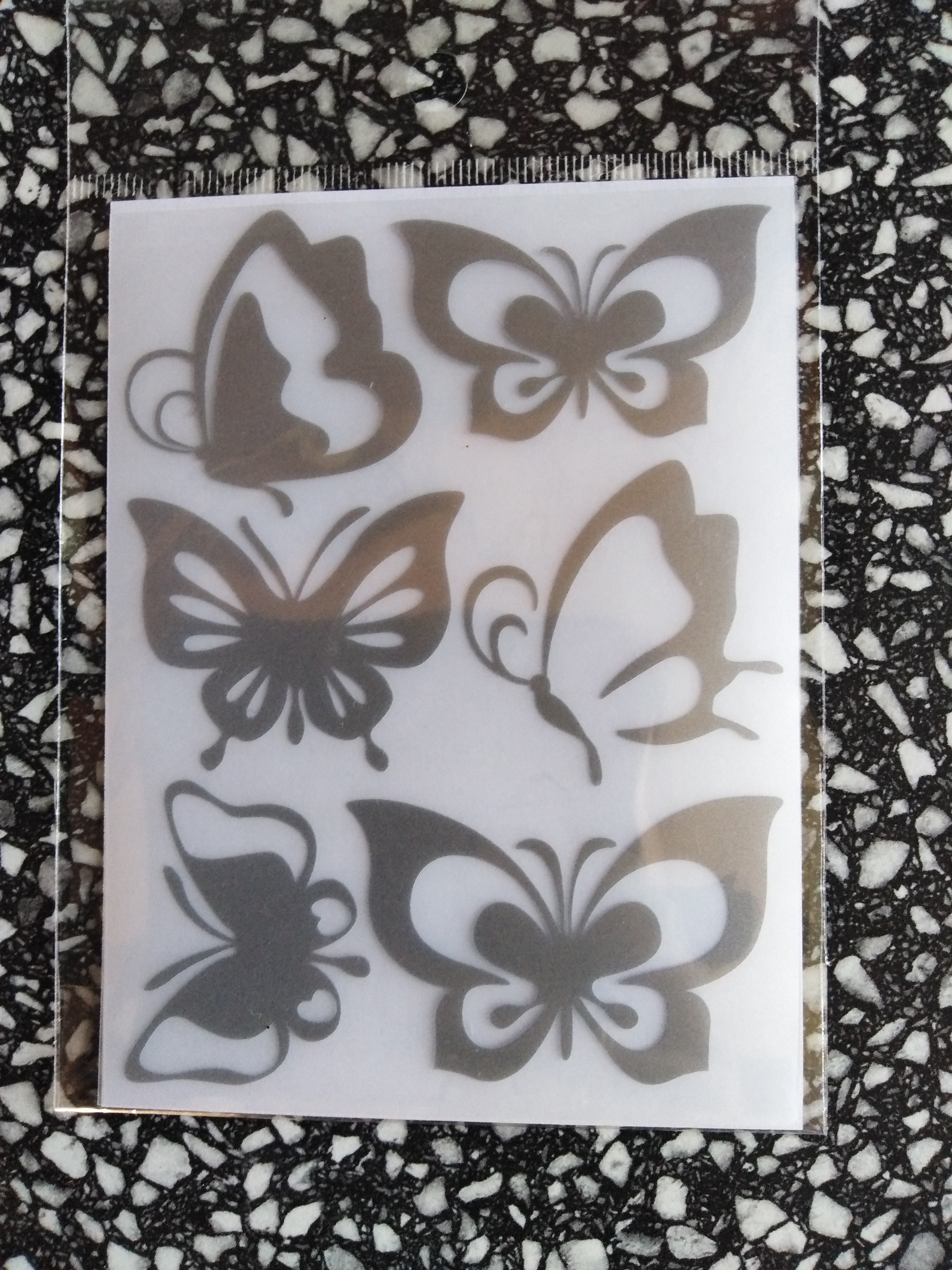 Reflexní motiv motýl