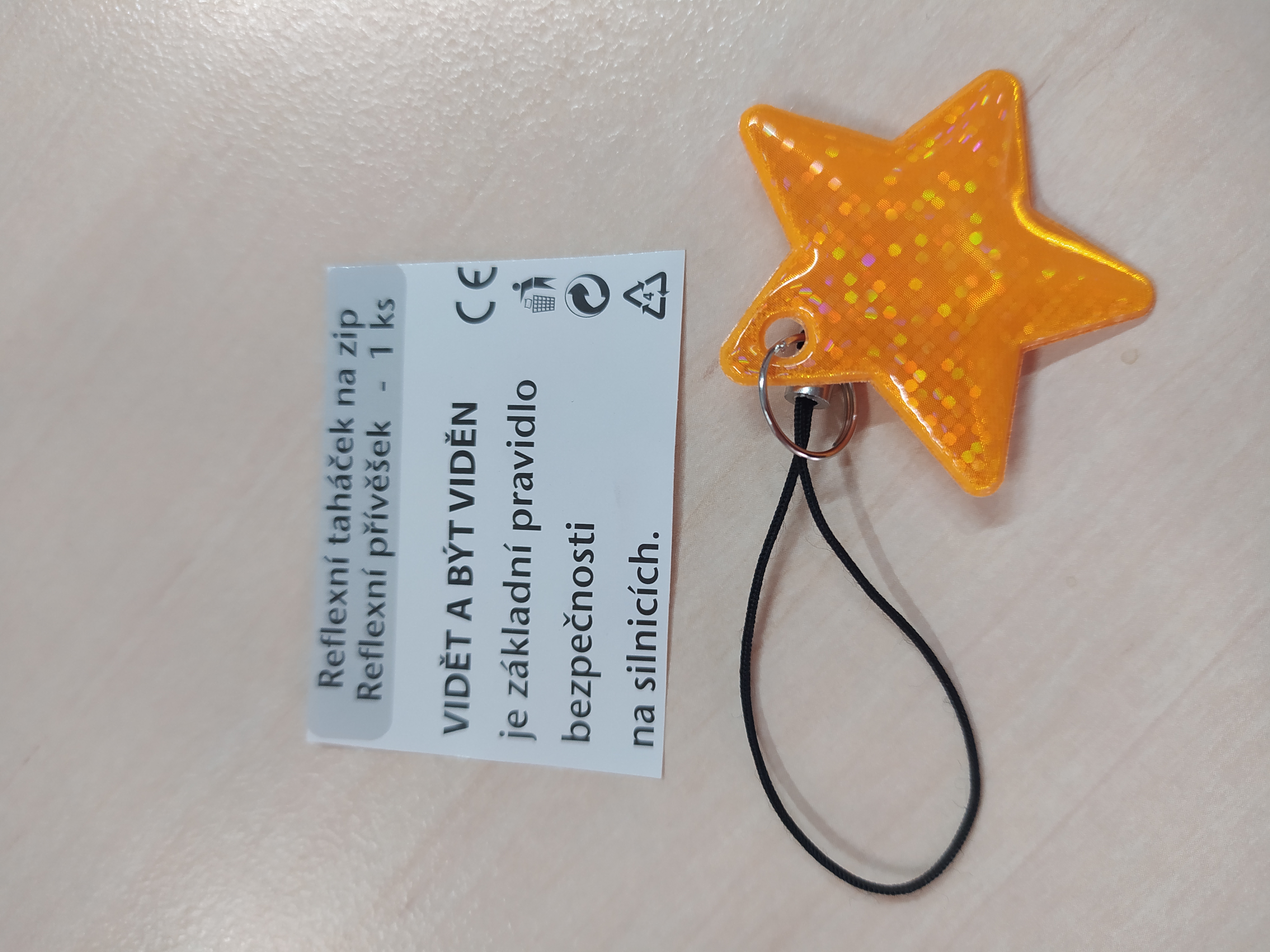Reflexní taháček na zip zlatá hvězdička