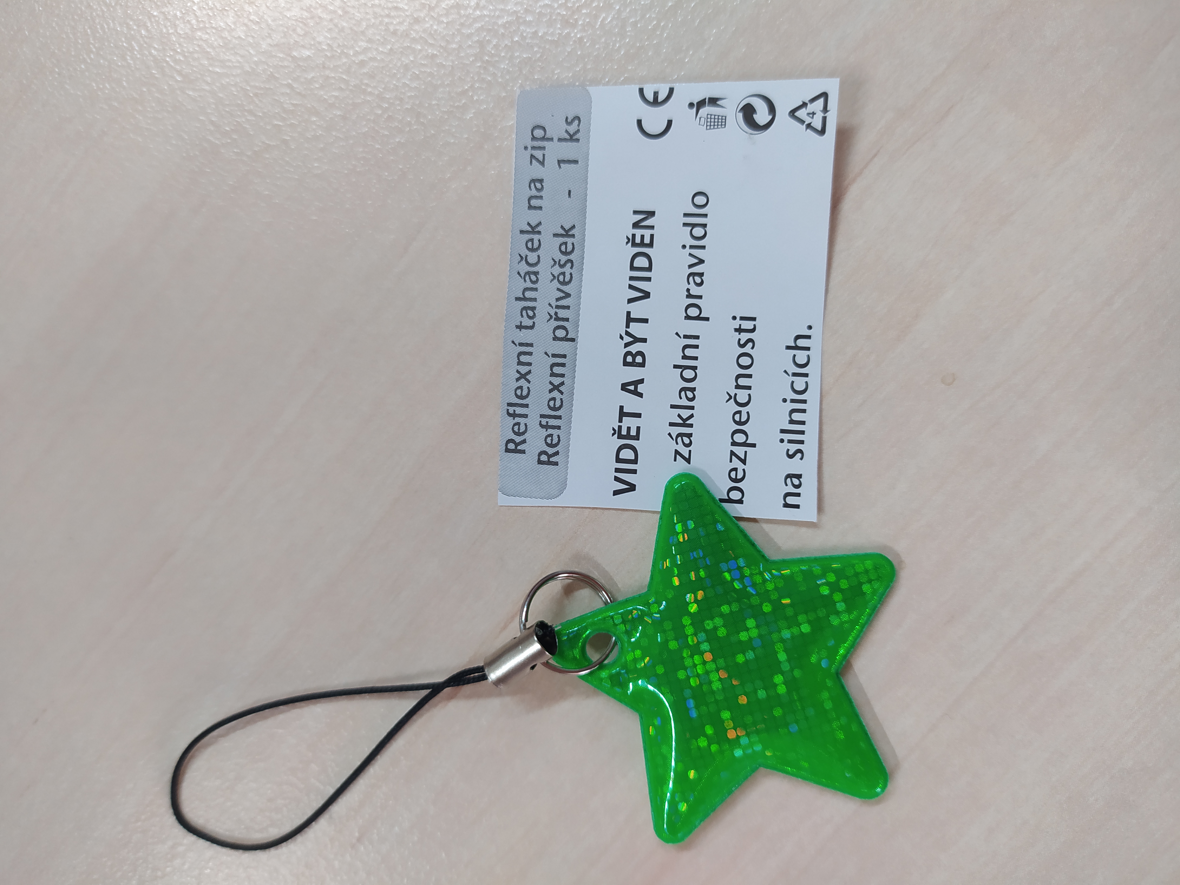Reflexní taháček na zip zelená hvězdička
