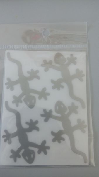 Reflexní motiv ještěrky