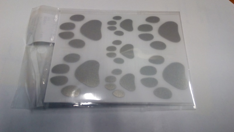 Reflexní motiv tlapky