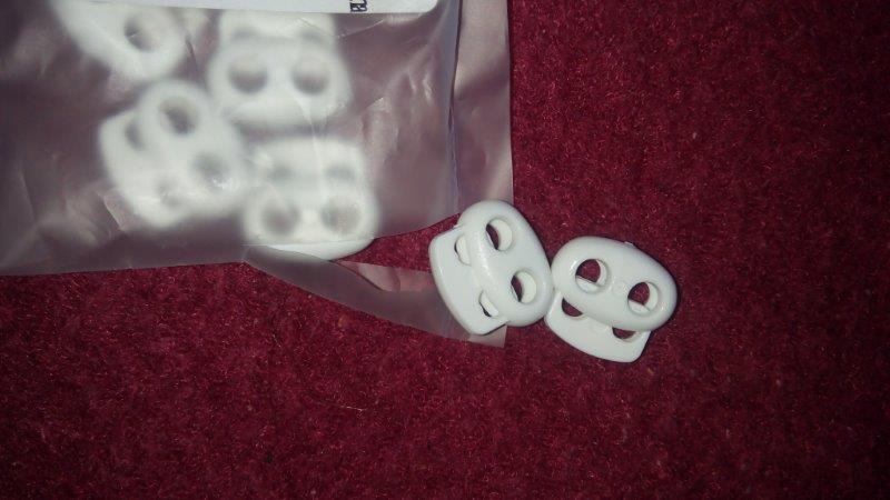 Brzdička dvoušňůrová velká bílá