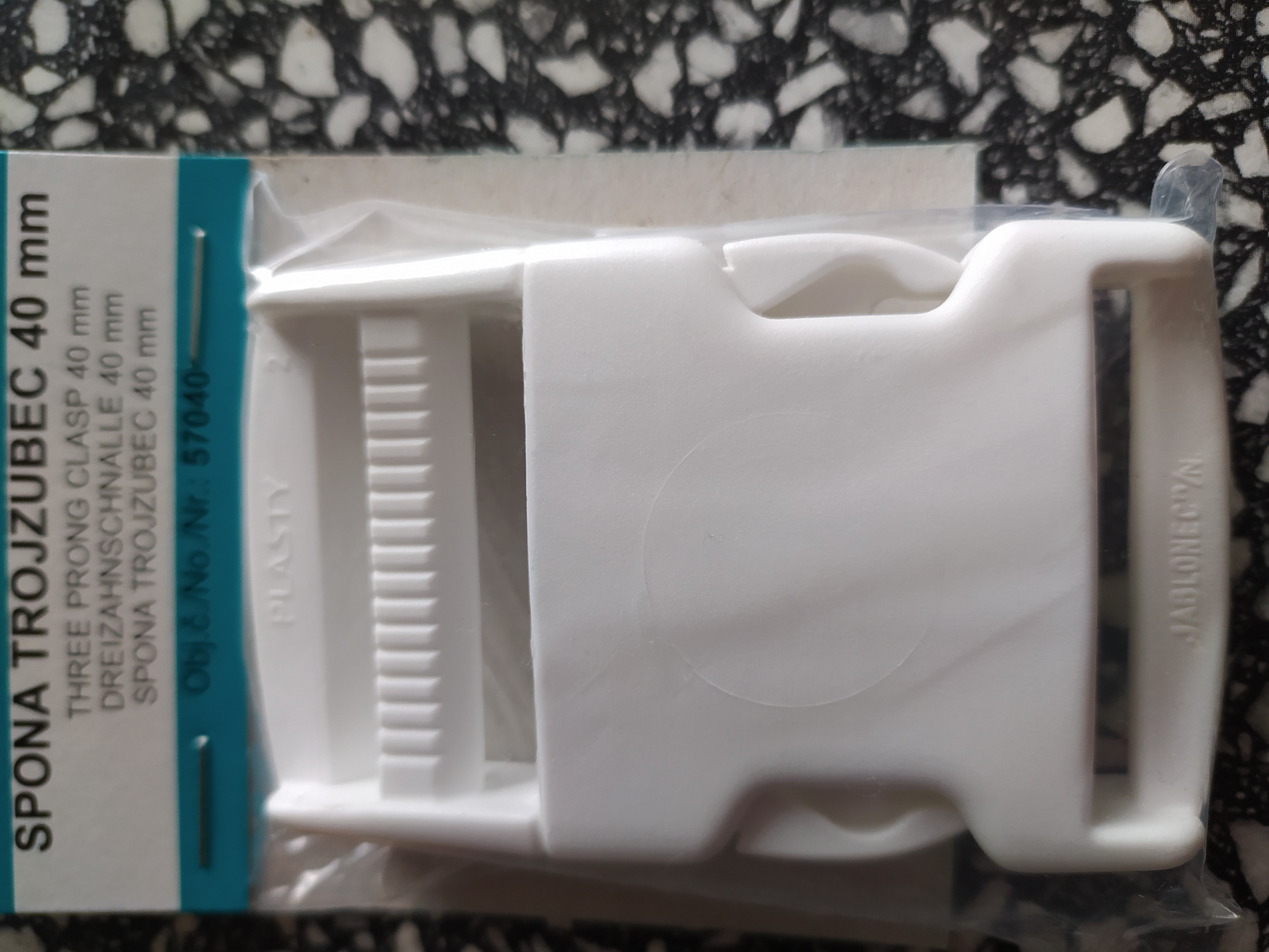 Spona plastová trojzubec 40 mm bílá