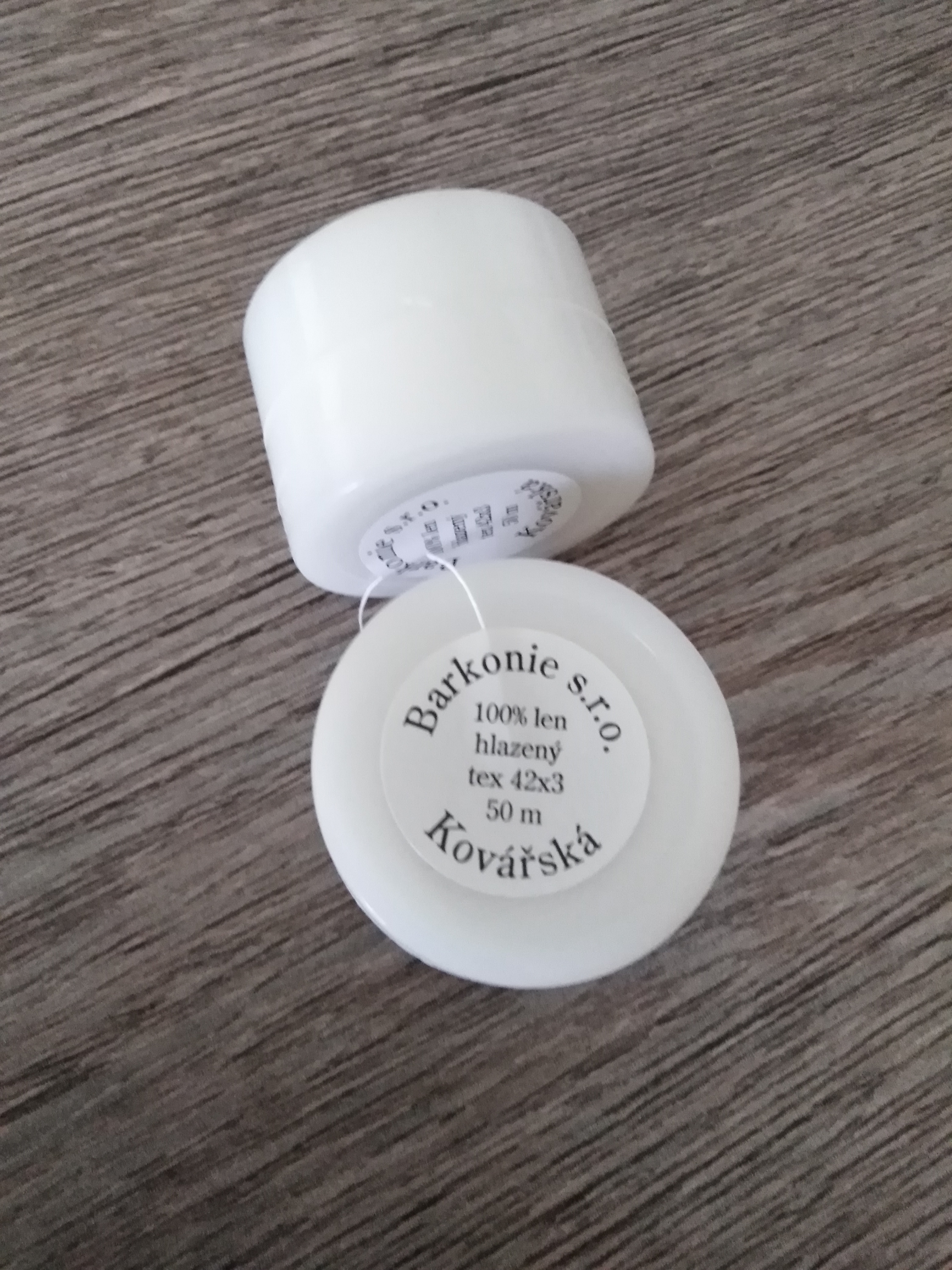 Lněná knoflíková niť - kapsle 50 m bílá