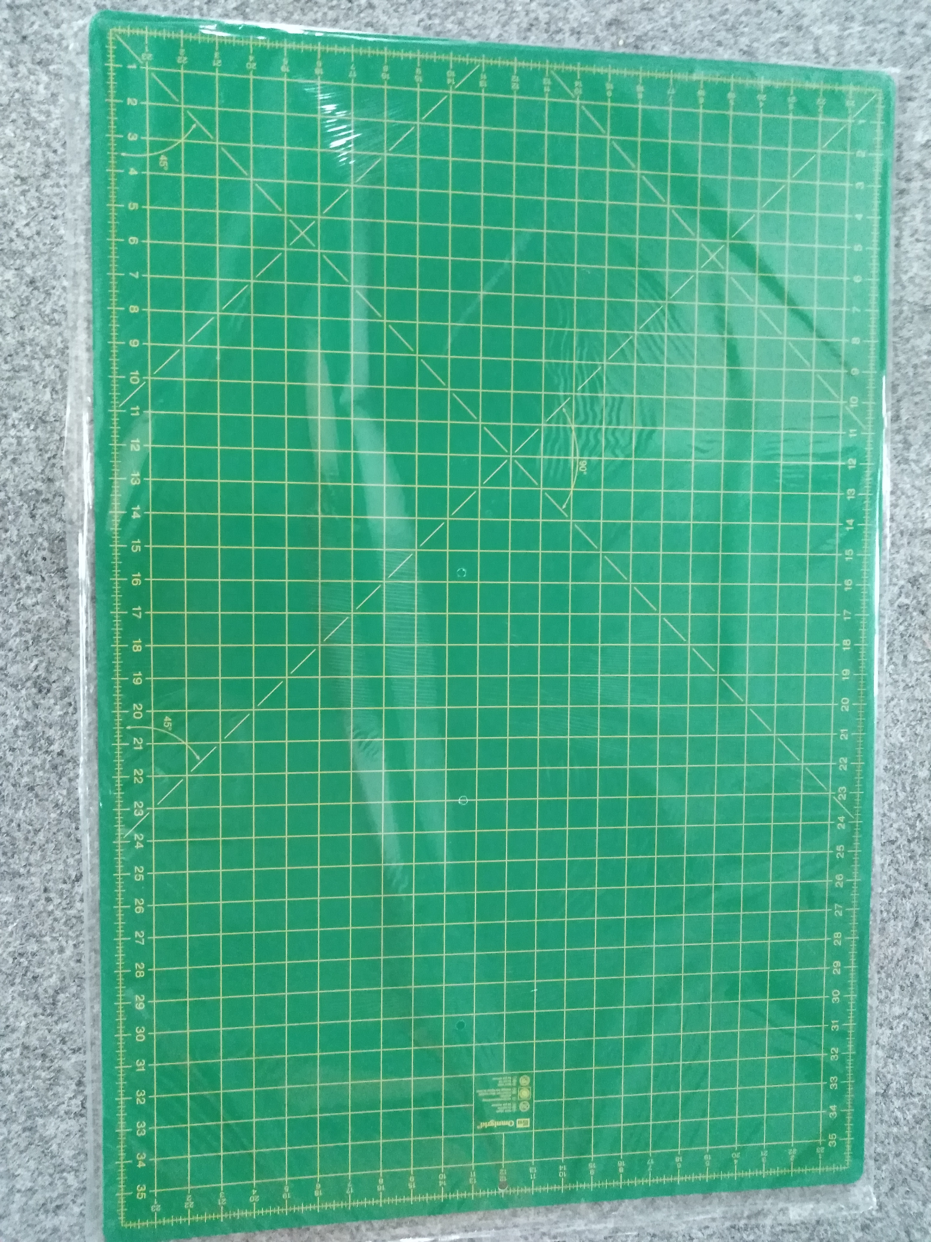 Oboustranná řezecí podložka OMNIGRID 90 x 60 cm tmavě zelená