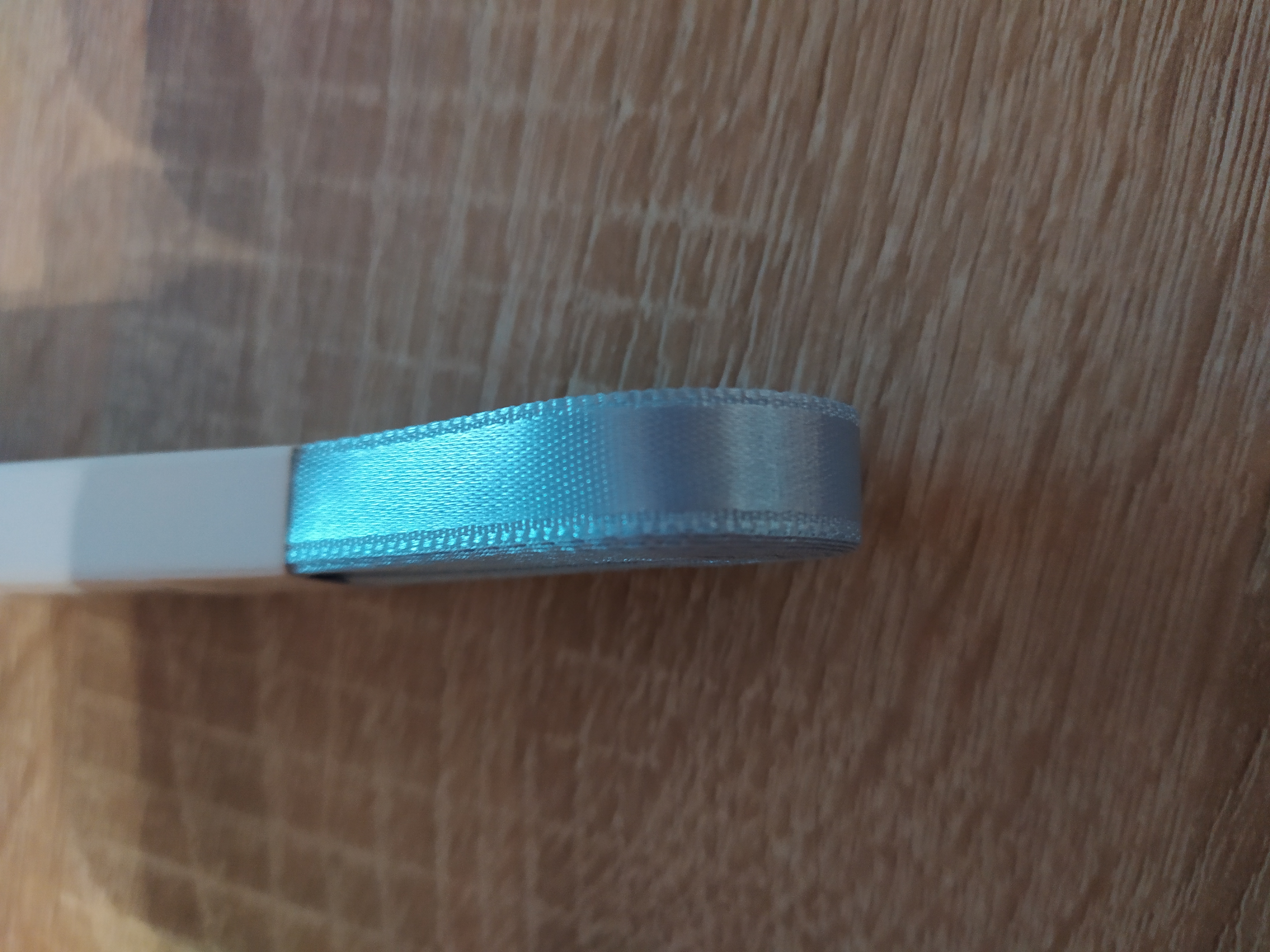 Stuha atlasová oboulící 10 mm bleděmodrá