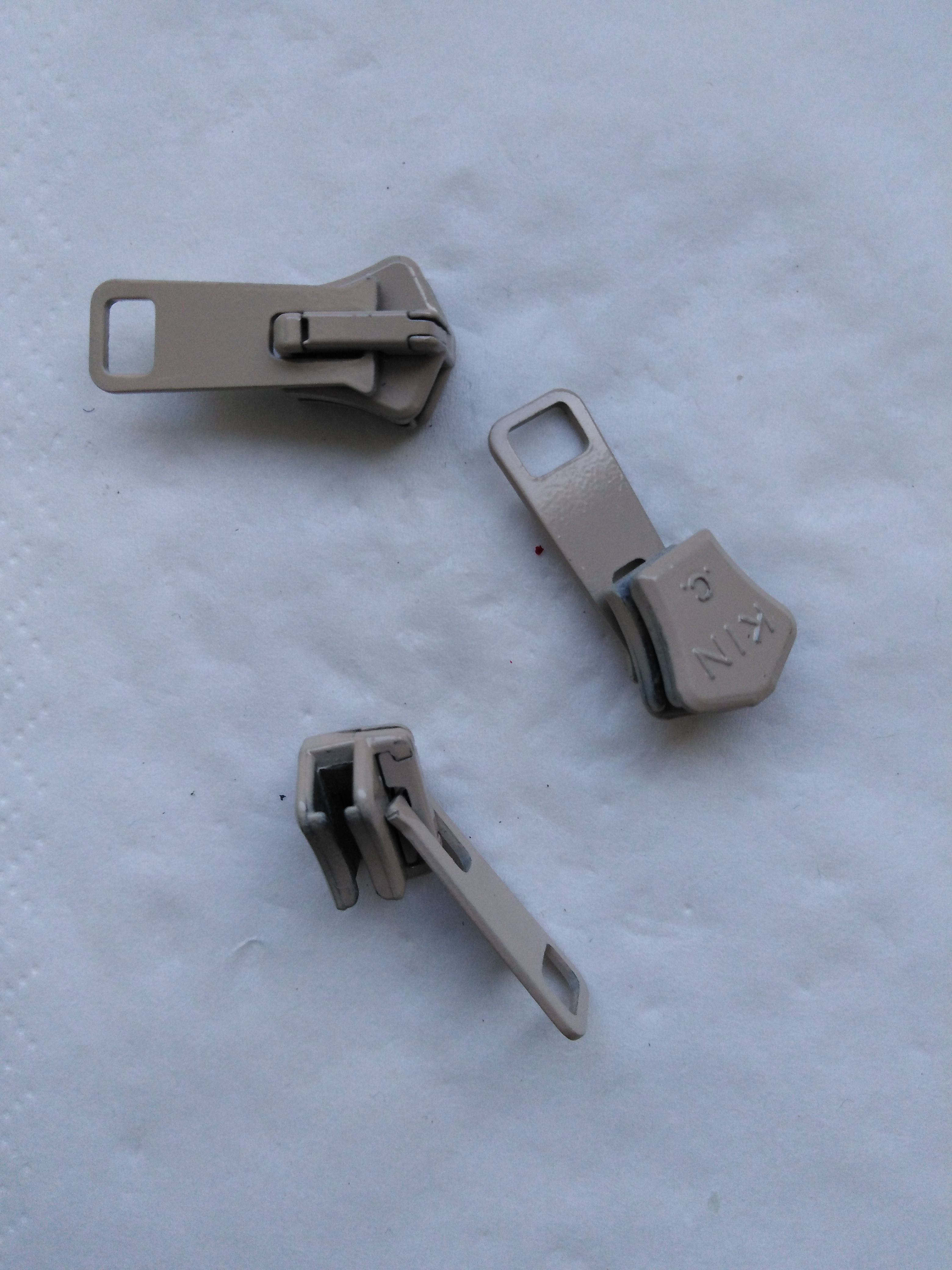 Jezdec k zipům PH6 aretační lakovaný světle hnědý